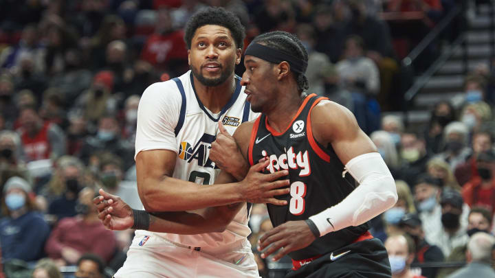 Dec 29, 2021; Portland, Oregon, USA; Utah Jazz forward Rudy Gay (8) and Portland Trail Blazers forward Cameron McGriff (8) jockey for position during the second half at Moda Center. The Jazz won the game 120-105. Mandatory Credit: Troy Wayrynen-USA TODAY Sports