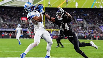 Detroit Lions wide receiver Amon-Ra St. Brown (14) makes a catch for a touchdown against Baltimore Ravens cornerback Marlon Humphrey (44) during the second half at M&T Bank Stadium in Baltimore, Md. on Monday, Sept. 22, 2025.