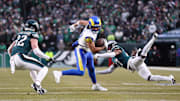 Jan 19, 2025; Philadelphia, Pennsylvania, USA; Los Angeles Rams wide receiver Puka Nacua (17) intercepts a pass in front of Philadelphia Eagles safety Reed Blankenship (32) and Eagles cornerback Quinyon Mitchell (27) during the first half in a 2025 NFC divisional round game at Lincoln Financial Field. Mandatory Credit: Bill Streicher-Imagn Images