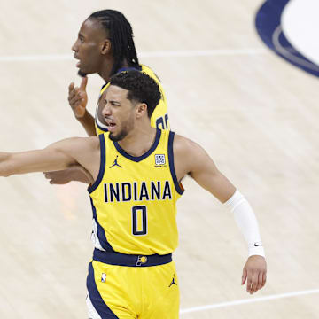 Jun 22, 2025; Oklahoma City, Oklahoma, USA; Indiana Pacers guard Tyrese Haliburton (0) reacts after a play against the Oklahoma City Thunder during the first half of game seven of the 2025 NBA Finals at Paycom Center. Mandatory Credit: Alonzo Adams-Imagn Images