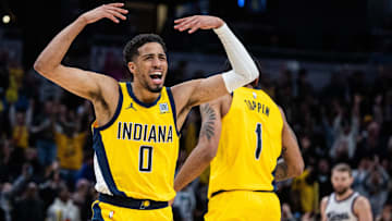Mar 31, 2025; Indianapolis, Indiana, USA; Indiana Pacers guard Tyrese Haliburton (0) celebrates the game winning basket in the second half against the Sacramento Kings at Gainbridge Fieldhouse. Mandatory Credit: Trevor Ruszkowski-Imagn Images