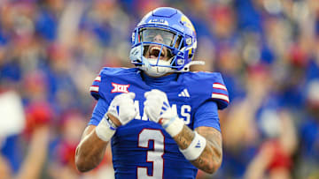 Aug 23, 2025; Lawrence, Kansas, USA; Kansas Jayhawks wide receiver Keaton Kubecka (3) celebrates after scoring a touchdown during the second half against the Fresno State Bulldogs at David Booth Kansas Memorial Stadium. Mandatory Credit: Jay Biggerstaff-Imagn Images