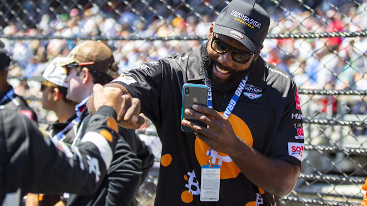 Russell Okung in attendance of the IndyCar Series 105th Running of the Indianapolis 500 at Indianapolis Motor Speedway. Russell Okung in attendance of the IndyCar Series 105th Running of the Indianapolis 500 at Indianapolis Motor Speedway.