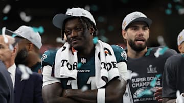 Feb 9, 2025; New Orleans, LA, USA; Philadelphia Eagles wide receiver A.J. Brown (L) stands on the stage during the championship trophy presentation after the Eagles' game against the Kansas City Chiefs in Super Bowl LIX at Caesars Superdome. Mandatory Credit: Geoff Burke-Imagn Images