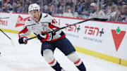 Washington Capitals defenseman Martin Fehervary skates up the ice against the Winnipeg Jets in the second period.