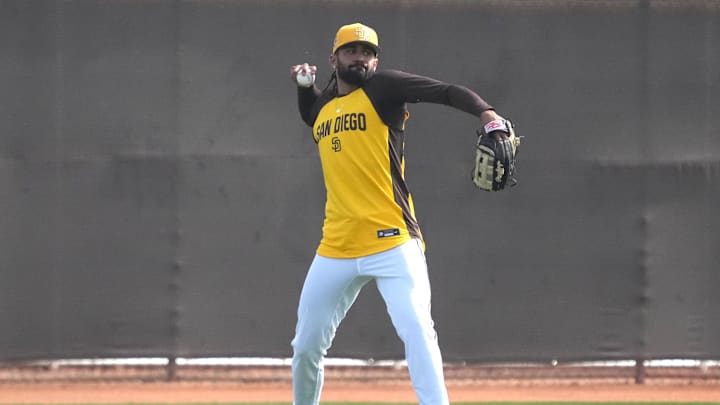 Feb 15, 2026; Peoria, AZ, USA; San Diego Padres right fielder Fernando Tatis Jr. (23) shags balls in the outfield during spring training camp. Mandatory Credit: Rick Scuteri-Imagn Images