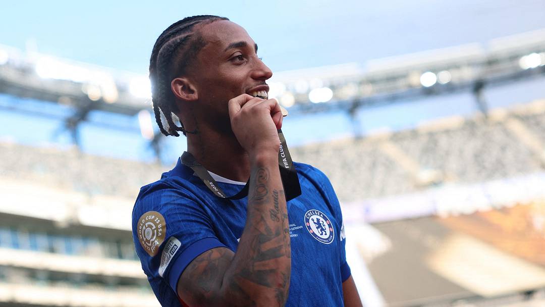 Jul 13, 2025; East Rutherford, New Jersey, USA; Chelsea FC forward Joao Pedro (20) celebrates with his medal after winning the final of the 2025 FIFA Club World Cup at MetLife Stadium. 