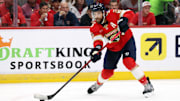 May 11, 2025; Sunrise, Florida, USA; Florida Panthers defenseman Aaron Ekblad (5) passes the puck against the Toronto Maple Leafs during the second period in game four of the second round of the 2025 Stanley Cup Playoffs at Amerant Bank Arena. Mandatory Credit: Kim Klement Neitzel-Imagn Images