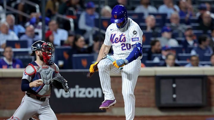 Sep 4, 2024; New York City, New York, USA; New York Mets first baseman Pete Alonso (20) breaks his bat over his leg after striking out during the eighth inning against the Boston Red Sox at Citi Field. 