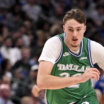 Oct 26, 2025; Dallas, Texas, USA; Dallas Mavericks forward Cooper Flagg (32) brings the ball up court against the Toronto Raptors during the second half at the American Airlines Center. Mandatory Credit: Jerome Miron-Imagn Images