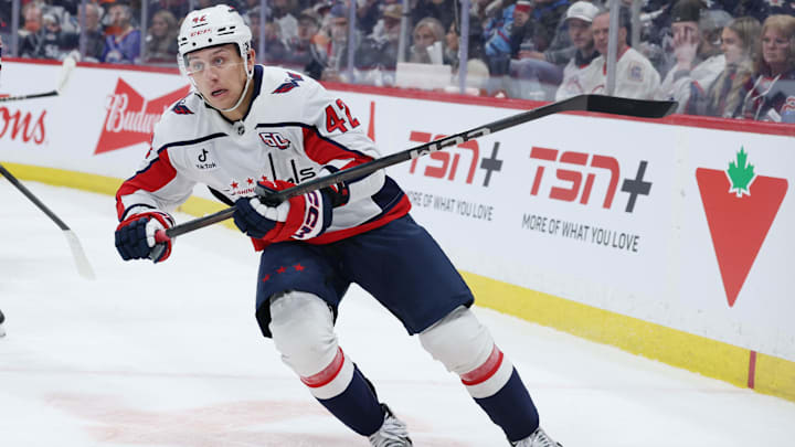 Mar 25, 2025; Winnipeg, Manitoba, CAN; Washington Capitals defenseman Martin Fehervary (42) skates up the ice against the Winnipeg Jets in the second period at Canada Life Centre. Mandatory Credit: James Carey Lauder-Imagn Images