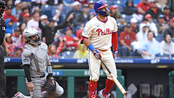 Kyle Schwarber admires his home run