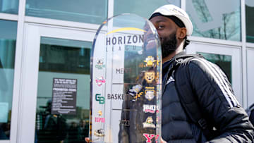 The Northern Kentucky Norse senior Trevon Faulkner carries the Horizon League Championship Trophy as basketball team returns to campus at Truist Arena in Highland Heights, Ky., on Wednesday, March 8, 2023. The Northern Kentucky Norse won an automatic berth to the NCAA Championship with a 63-61 win over Cleveland State in the Horizon League Tournament finals.

Nku Norse Championship Return