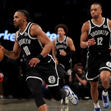 Apr 10, 2025; Brooklyn, New York, USA; Brooklyn Nets guard Tyson Etienne (10) brings the ball up court against the Atlanta Hawks during the second quarter at Barclays Center. Mandatory Credit: Brad Penner-Imagn Images