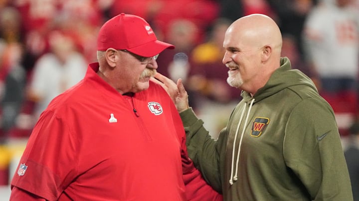 Oct 27, 2025; Kansas City, Missouri, USA; Kansas City Chiefs head coach Andy Reid speaks with Washington Commanders head coach Dan Quinn during warmups prior to the game at GEHA Field at Arrowhead Stadium. Mandatory Credit: Denny Medley-Imagn Images