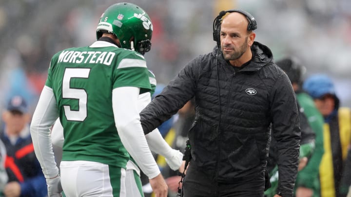 Dec 3, 2023; East Rutherford, New Jersey, USA; New York Jets head coach Robert Saleh greets punter Thomas Morstead (5) as he returns to the sideline after a punt against the Atlanta Falcons during the first quarter at MetLife Stadium.