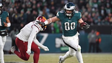 Jan 26, 2025; Philadelphia, PA, USA; Philadelphia Eagles tight end Dallas Goedert (88) tries to get past Washington Commanders cornerback Mike Sainristil (0) in the NFC Championship game at Lincoln Financial Field.