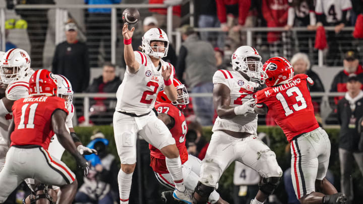 Nov 11, 2023; Athens, Georgia, USA; Mississippi Rebels quarterback Jaxson Dart (2) passes against the Georgia Bulldogs during the first quarter at Sanford Stadium. Mandatory Credit: Dale Zanine-USA TODAY Sports