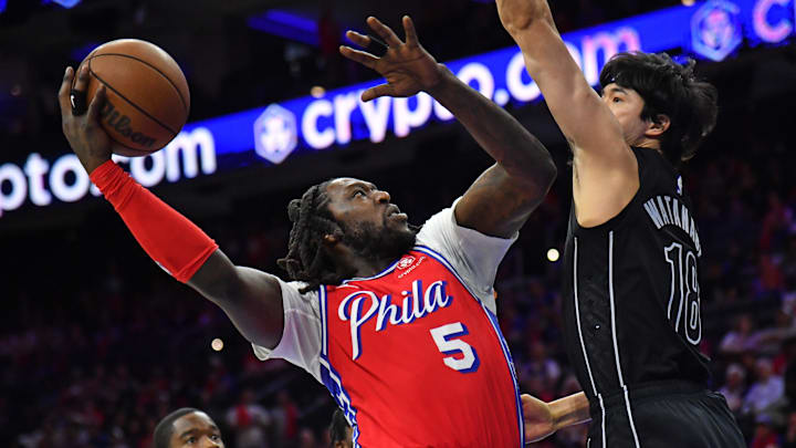 Apr 15, 2023; Philadelphia, Pennsylvania, USA; Philadelphia 76ers center Montrezl Harrell (5) shoots over Brooklyn Nets forward Yuta Watanabe (18) during game one of the 2023 NBA playoffs at Wells Fargo Center. Mandatory Credit: Eric Hartline-Imagn Images