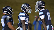 Dorman Carter Nash (24) celebrates with Dorman Nathan Chhoy (50) and Dorman Corey Cole (16) after scoring Friday, Oct. 24, 2025, during the SCHSL football game against Gaffney at Dorman High School in Roebuck, South Carolina.