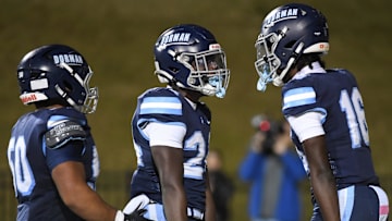 Dorman Carter Nash (24) celebrates with Dorman Nathan Chhoy (50) and Dorman Corey Cole (16) after scoring Friday, Oct. 24, 2025, during the SCHSL football game against Gaffney at Dorman High School in Roebuck, South Carolina.