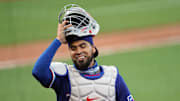 Aug 1, 2020; San Francisco, California, USA; Texas Rangers catcher Robinson Chirinos (61) smiles on the field at the end of the second inning against the San Francisco Giants at Oracle Park. 