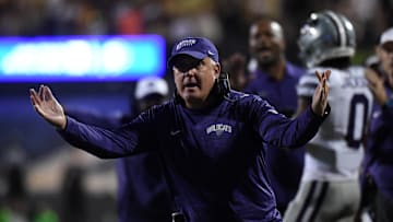 Oct 12, 2024; Boulder, Colorado, USA; Kansas State Wildcats head coach Chris Klieman celebrates after a touchdown during the first half against the Colorado Buffaloes at Folsom Field. Mandatory Credit: Christopher Hanewinckel-Imagn Images