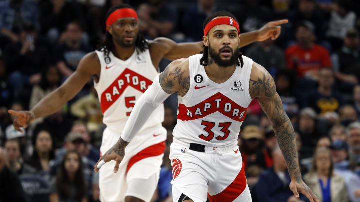 Feb 5, 2023; Memphis, Tennessee, USA; Toronto Raptors forward Precious Achiuwa (5) and Toronto Raptors guard Gary Trent Jr. (33) get back on defense during the first half against the Memphis Grizzlies at FedExForum. Mandatory Credit: Petre Thomas-USA TODAY Sports