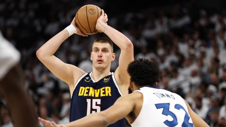 Apr 23, 2023; Minneapolis, Minnesota, USA; Denver Nuggets center Nikola Jokic (15) looks to pass during a game against the Minnesota Timberwolves.