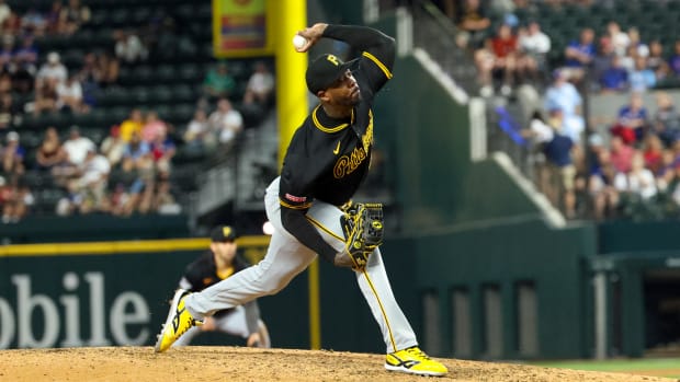 Former Rangers reliever Aroldis Chapman pitched a perfect eighth for the Pirates on Tuesday night.