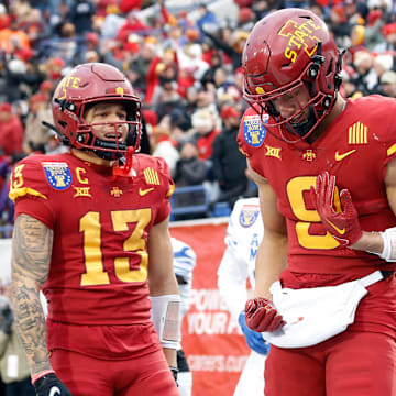 Dec 29, 2023; Memphis, TN, USA; Iowa State Cyclones wide receiver Jaylin Noel (13) and wide receiver Jayden Higgins (9) react after a touchdown during the first half against the Memphis Tigers at Simmons Bank Liberty Stadium. Mandatory Credit: Petre Thomas-Imagn Images