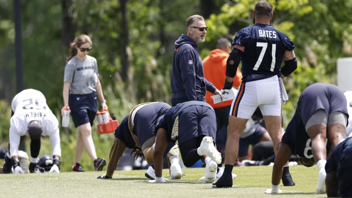 Matt Eberflus presides over Bears warmups during minicamp. Eberflus remains one of the coach of the year betting favorites.