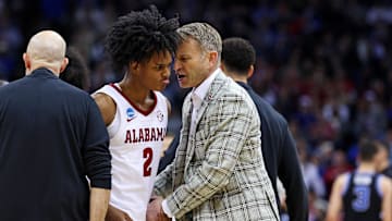 Mar 27, 2025; Newark, NJ, USA; Alabama Crimson Tide guard Aden Holloway (2) talks to head coach Nate Oats during the second half against the Brigham Young Cougars during an East Regional semifinal of the 2025 NCAA tournament at Prudential Center. Mandatory Credit: Vincent Carchietta-Imagn Images