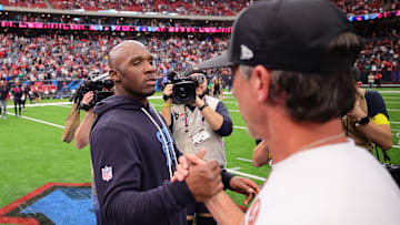 DeMeco Ryans and Kyle Shanahan meet at the 50 yard line after the Houston Texans earn a 26-15 win over the San Francisco 49ers