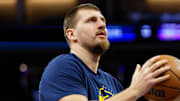 Denver Nuggets center Nikola Jokic (15) warms up before the game against the Sacramento Kings at Golden 1 Center.