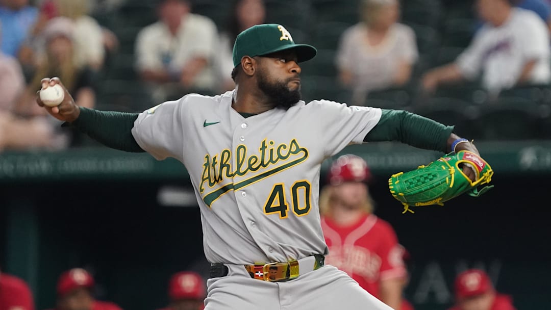 Apr 24, 2026; Arlington, Texas, USA;  Athletics pitcher Luis Severino (40) throws to the plate against the Texas Rangers during the first inning at Globe Life Field. Mandatory Credit: Raymond Carlin III-Imagn Images
