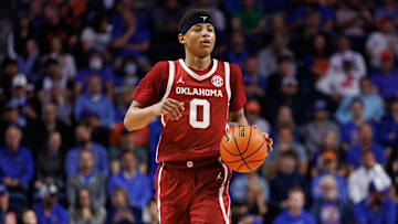 Feb 18, 2025; Gainesville, Florida, USA; Oklahoma Sooners guard Jeremiah Fears (0) dribbles the ball against the Florida Gators during the first half at Exactech Arena at the Stephen C. O'Connell Center. Mandatory Credit: Matt Pendleton-Imagn Images