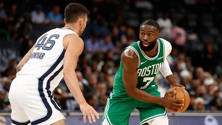 Oct 8, 2025; Memphis, Tennessee, USA; Boston Celtics guard Jaylen Brown (7) handles the ball as Memphis Grizzlies John Konchar (46) defends during the second quarter at FedExForum. Mandatory Credit: Petre Thomas-Imagn Images