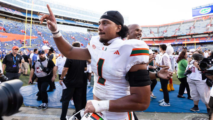 Aug 31, 2024; Gainesville, Florida, USA; Miami Hurricanes quarterback Cam Ward (1) reacts after a game against the Florida Gators at Ben Hill Griffin Stadium. Mandatory Credit: Matt Pendleton-USA TODAY Sports