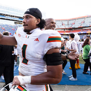 Aug 31, 2024; Gainesville, Florida, USA; Miami Hurricanes quarterback Cam Ward (1) reacts after a game against the Florida Gators at Ben Hill Griffin Stadium. Mandatory Credit: Matt Pendleton-Imagn Images