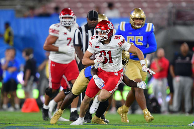 Utah tight end JJ Buchanan runs the ball against UCLA.