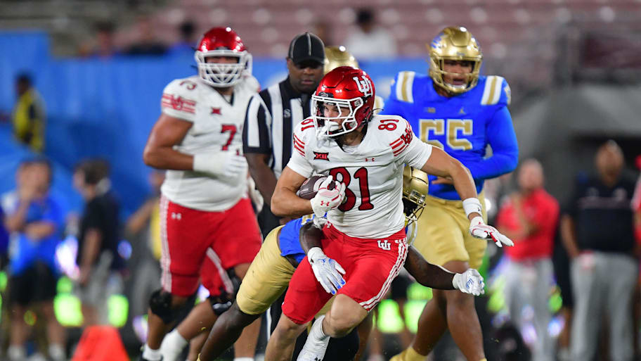 Utah tight end JJ Buchanan runs the ball against UCLA.