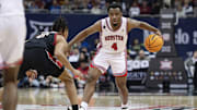 Mar 15, 2024; Kansas City, MO, USA; Houston Cougars guard LJ Cryer (4) controls the ball while defended by Texas Tech Red Raiders guard Chance McMillian (0)  in the second half at T-Mobile Center. Mandatory Credit: Amy Kontras-Imagn Images
