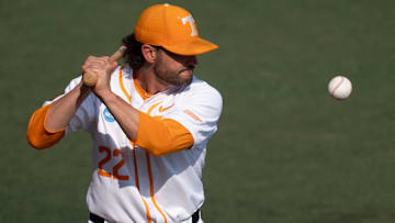 Tennessee baseball coach Tony Vitello hits balls to his players as they warm up before the start of the NCAA college baseball Knoxville Regional against Wake Forest on June 2, 2025, in Knoxville, Tenn.