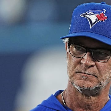 Aug 17, 2025; Toronto, Ontario, CAN; Toronto Blue Jays bench coach Don Mattingly (46) talks with the media during batting practice before a game against the Texas Rangers at Rogers Centre.
