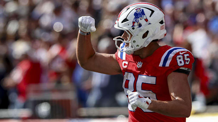 Sep 21, 2025; Foxborough, Massachusetts, USA; New England Patriots tight end Hunter Henry (85) celebrates after scoring a touchdown during the fourth quarter at Gillette Stadium. Mandatory Credit: Paul Rutherford-Imagn Images