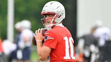 Jun 9, 2025; Foxborough, MA, USA; New England Patriots quarterback Drake Maye (10) looks to pass the ball during minicamp at Gillette Stadium. Mandatory Credit: Eric Canha-Imagn Images