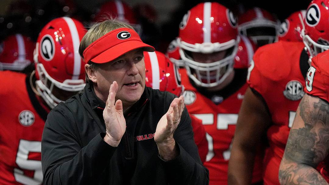 Georgia coach Kirby Smart takes the field with his team before the start of the SEC championship game against Texas in Atlanta, on Saturday, Dec. 7, 2024.