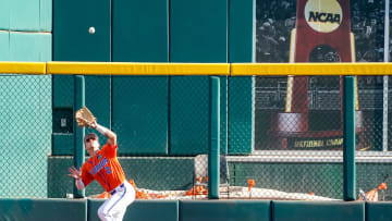 Jun 26, 2023; Omaha, NE, USA; Florida Gators right fielder Ty Evans (2) makes a catch for an out against the LSU Tigers during the first inning at Charles Schwab Field Omaha. Mandatory Credit: Dylan Widger-USA TODAY Sports