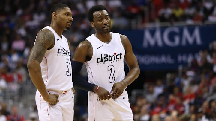 Apr 22, 2018; Washington, DC, USA; Washington Wizards guard Bradley Beal (3) talks with Washington Wizards guard John Wall (2) against the Toronto Raptors in the second quarter in game four of the first round of the 2018 NBA Playoffs at Capital One Arena. The Wizards won 106-98. Mandatory Credit: Geoff Burke-Imagn Images